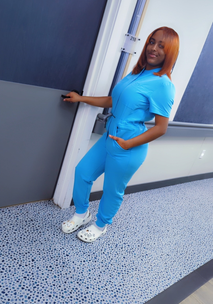 Aqua scrub romper with ribbed bottom for women, medical jumpsuit uniform