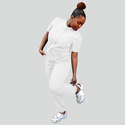 Upgrade your uniform with the White Scrubs Romper for Women. Breathable stretch fabric, ribbed bottom, and deep pockets. A clean, modern medical scrub jumpsuit.